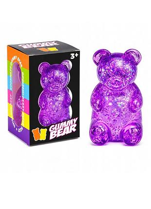 Антистресс мишка с глиттером squishy gummy bear glitter 7×4 см фиолетовый 1 шт