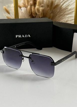 Сонцезахисні окуляри prada для середнього обличчя