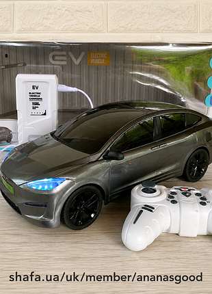 Машинка на радиоуправлении tesla model x серая 30.5 см с зарядной станцией (горят фары, звук, парковка)