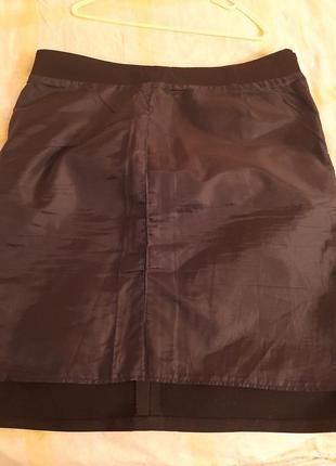 Классическая чёрная юбка-карандаш из плотной ткани.9 фото