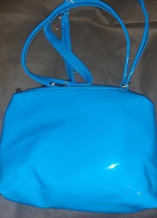 Голубий лаковий клатч linea style еко шкіра новий бірки