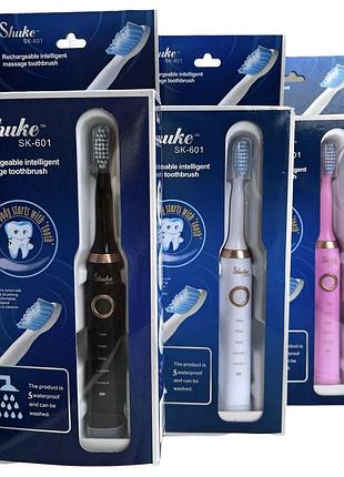 Електрична зубна щітка shuke sk-601 з трьома змінними насадками, компактна модель для щоденного очищення