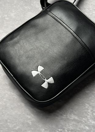 Барсетка шкір. чорна under armour біле лого #