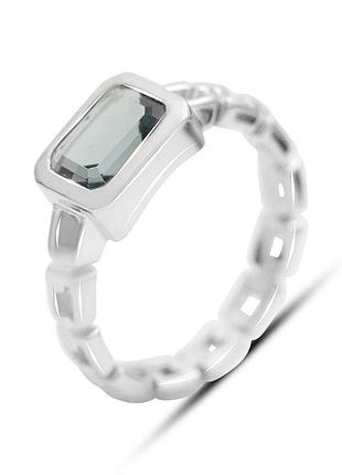 Серебряное кольцо komilfo с топазом лондон блю 1.475ct, вес изделия 3,29 гр (2174158) 17.5 размер