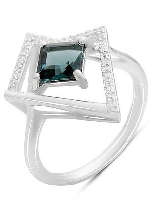 Серебряное кольцо komilfo с топазом лондон блю 1.185ct, вес изделия 3,06 гр (2204879) 18.5 размер