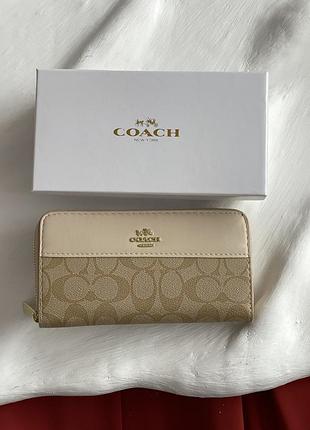 Гаманець coach signature accordion zip wallet молочний
