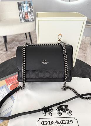 Coach black silver