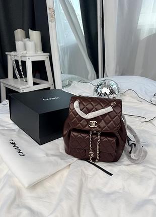 Chanel medium backpack dark burgundy lambskin with silver-tone metal