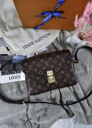 Lv pochette metis brown coated canvas gold