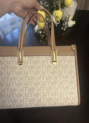 Сумка michael kors в бежевому кольорі