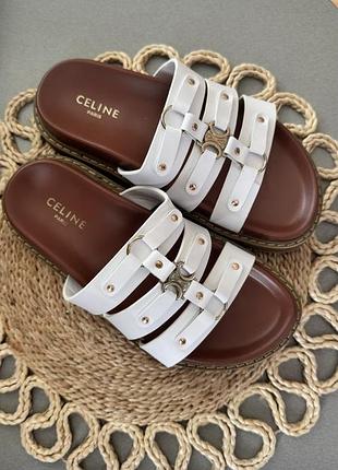 Білі шльопанці celine