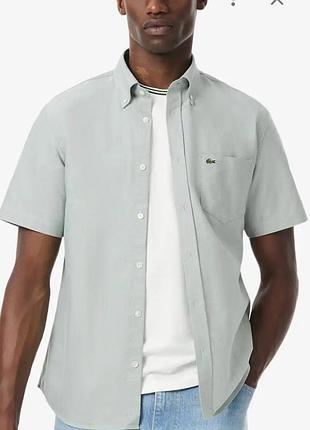 Чоловіча сорочка lacoste з коротким рукавом (розмір 44 / xl) 100% бавовна ,оригінал.
в ідеальному стані.