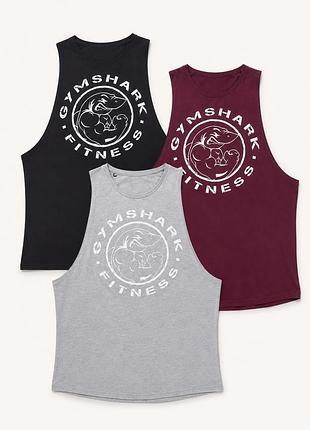 Продам стильні спортивні майки/
від відомого брендуgymshark legacy drop arm tank top