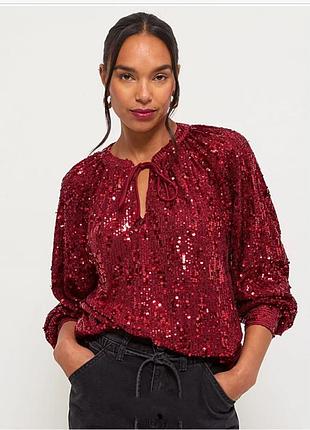 Красная блузка с пайетками и завязкой на шее напоминает модель от george at asda.