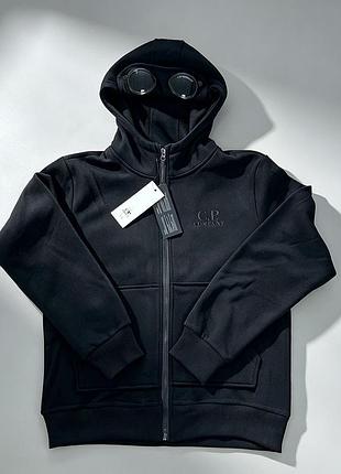 Кофта c.p. company чорного кольору, розміри s,m,l,xl з лінзами на капюшоні