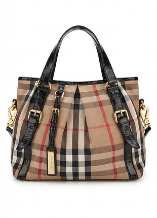 Женская сумка от бренда burberry в классическую клетку с отделкой из черной лакированной кожи
в идеальном состоянии