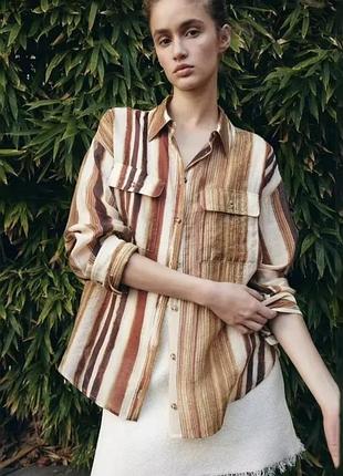 Смугаста сорочка від zara має вільний крій і виконана з легкого матеріалу