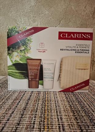 Clarins revitalizing and firming essentials набор из двух продуктов + косметичка