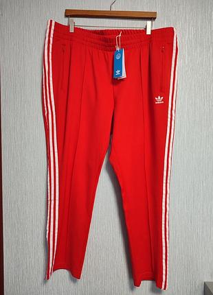 Яскраві червоні спортивні штани adidas оригінал
