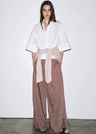 Zara широкі струмуючі штани у смужку, брюки