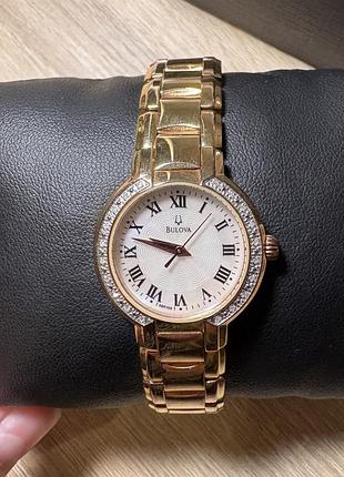 Женские часы bulova с бриллиантовым безелем
