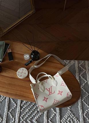 Louis vuitton onthego pm bag in bicolor pink/white