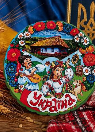 Сувенірний магніт "україна" обертовий 8.5 см – дерев'яний магніт на холодильник 4 зображення, український сувенір