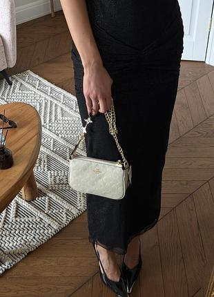 Жіноча сумка coach nolita 19 кремова