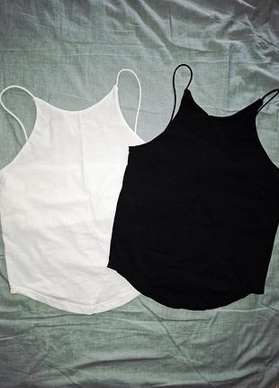 Женские трикотажные майки (топы) типа «халтер» с высокой горловиной (high neck) и тонкими бретельками.