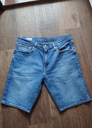 Продам фирменные мужские джинсовые шорты levi's® 502™ taper fit shorts в размере w32 l. 100% оригинал.