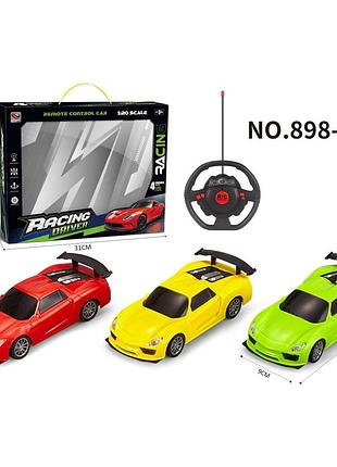 Радиоуправляемая спортивная игрушечная машинка racing driver №898-57a с рулем на аккумуляторе (30×25×7 см)