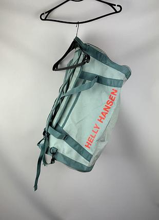 Дорожна сумка - рюкзак helly hansen hh duffel bag 2 50l оригінал на 50 літрів 2 в 1 колір мʼятний / мʼятно зелений / бірюзовий