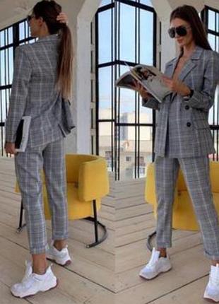 Жіночий класичний костюм брючний сірого кольору в клітинку zara