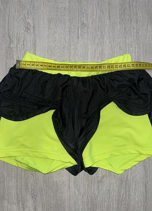 Спортивні подвійні жіночі шорти з неоновим підкладкою, розмір 44. стан хороший. для бігу, фітнесу і активних тренувань.