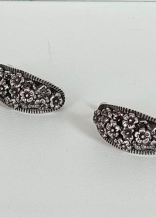 Серебряные серьги 925 пробы со звездочкой.