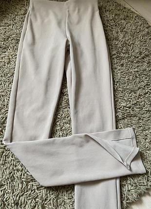 Легінси в рубчик zara по боках розрізи