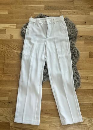 Білі брюки zara