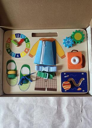 Бизиборд для мальчика разноцветный playtive 8090