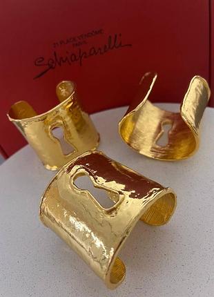 Браслети schiaparelli золоті замок