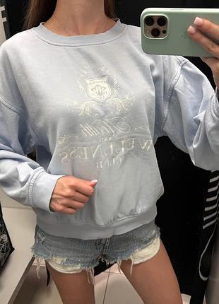 Ніжно-блакитний бавовняний світшот жіночий h&m у стилі бренду sporty and rich.