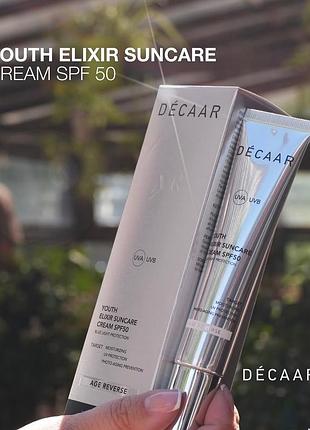 Крем-еліксир spf50 омолоджувальний сонцезахисний youth elixir suncare cream spf50 decaar