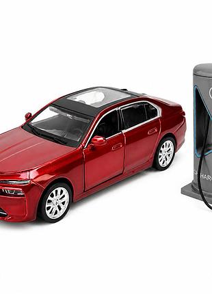 Іграшкова металева машинка bmw i7 масштаб 1:32 світяться фари та стопи звукові ефекти інерційний механізм зарядна станція