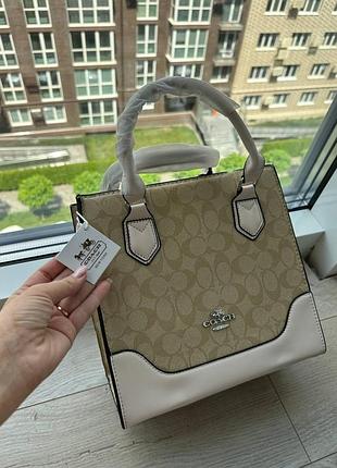 Стильна жіноча сумка coach