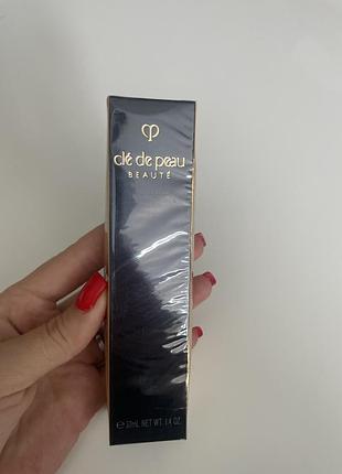 Освітлююча база під макіяж cle de peau beauty correcting cream veil 37 ml
