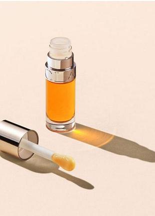 Олія для губ clarins lip comfort oil у відтінку 01 honey зволоження і глянсовий блиск губ бальзам блиск помада для губ