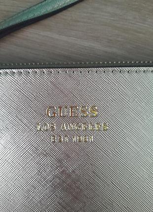 Guess небольшой клатч, золотого цвета