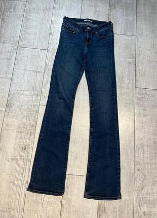 Женские джинсы клеш levis