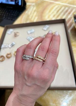 Кільце bvlgari срібного та золотого кольору з цирконами