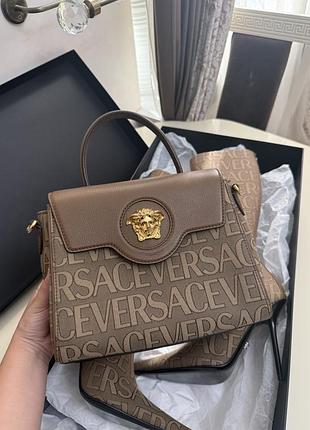 Продам женскую оригинальную сумку versace