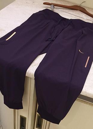 Новые.брюки спортивные nike dry fit 3/4 signature logo airy pants purple оригинал.